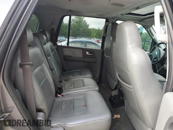 2004 Ford Expedition Special Service with VIN 1FMFU16L54LA95354, listed as a Copart auction lot 57027115 with 176,243 mi miles and Salvage title. Bid and sale history available at DreamBid. Image 11.