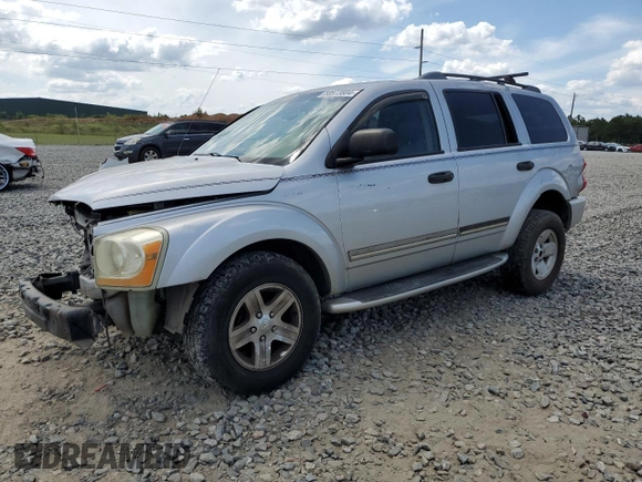 2004 Dodge Durango Limited with VIN 1D4HD58D94F154997, listed as a Copart auction lot 58973804 with 208,595 mi miles and Salvage title. Bid and sale history available at DreamBid. Image 1.