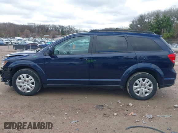 2019 Dodge Journey SE with VIN 3C4PDCBBXKT707700, listed as a IAAI auction lot 42038474 with 57,903 mi miles and . Bid and sale history available at DreamBid. Image 14.