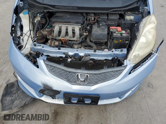 2010 Honda Fit Sport with VIN JHMGE8H64AC032634, listed as a Copart auction lot 61795825 with 143,593 mi miles and Salvage title. Bid and sale history available at DreamBid. Image 11.