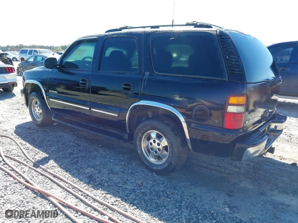 2001 Chevrolet Tahoe LT with VIN 1GNEC13T41J155954, listed as a IAAI auction lot 41810200 with 222,109 mi miles. Bid and sale history available at carsss.com. Image 3.