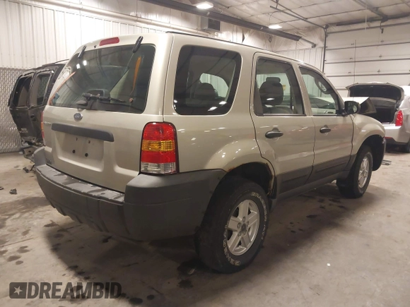 2005 Ford Escape XLS Value with VIN 1FMYU02Z35KA57707, listed as a IAAI auction lot 41759027 with 1 mi miles. Bid and sale history available at carsss.com. Image 4.