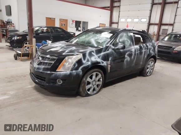 2011 Cadillac SRX Performance Collection with VIN 3GYFNEEY3BS560107, listed as a IAAI auction lot 42017220 with 243,740 mi miles and . Bid and sale history available at carsss.com. Image 6.