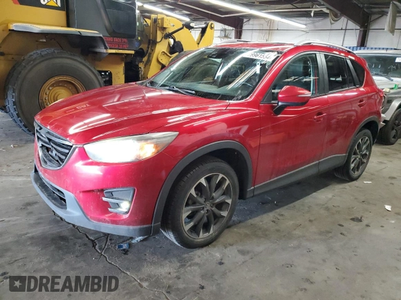 2016 Mazda CX-5 Grand Touring with VIN JM3KE4DY1G0669316, listed as a Copart auction lot 79961554 with 117,454 mi miles and Salvage Title. Bid and sale history available at carsss.com. Image 1.