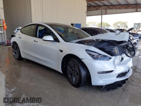 2023 Tesla Model 3 with VIN 5YJ3E1EA3PF515480, listed as a Copart auction lot 47342385 with 15,309 mi miles and Non Repairable. Bid and sale history available at DreamBid. Image 4.