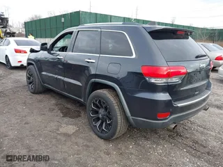 2014 Jeep Grand Cherokee Limited with VIN 1C4RJFBT7EC258715, listed as a IAAI auction lot 41735925 with 103,215 mi miles. Bid and sale history available at carsss.com. Image 3.