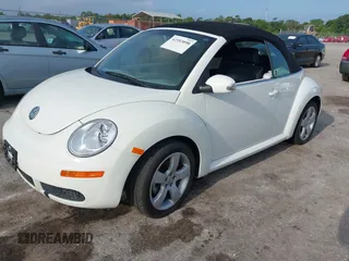 2009 Volkswagen Beetle S with VIN 3VWRF31YX9M402739, listed as a IAAI auction lot 42353898 with Not provided miles and . Bid and sale history available at DreamBid. Image 2.