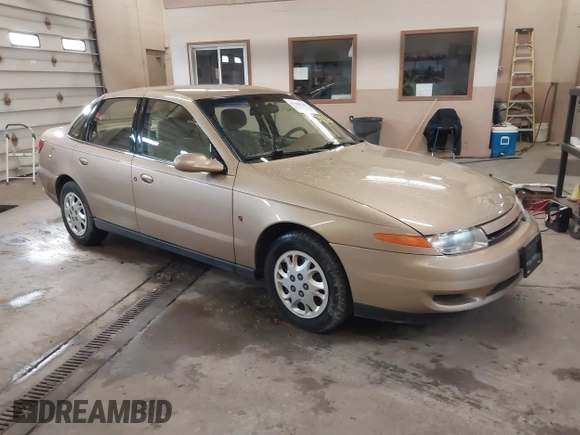 2002 Saturn LS z VIN 1G8JU54F52Y585354, wystawiony jako IAAI lot #41680106 z przebiegiem 90 431 mil mil oraz . Historia ofert i sprzedaży dostępna na DreamBid. Obrazek 1.