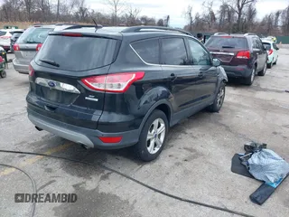 2014 Ford Escape SE with VIN 1FMCU0GXXEUA88622, listed as a IAAI auction lot 41727642 with 22,358 mi miles and . Bid and sale history available at DreamBid. Image 4.
