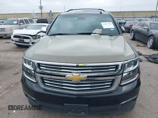 2019 Chevrolet Suburban Premier with VIN 1GNSKJKJ3KR231852, listed as a IAAI auction lot 41957728 with 136,263 mi miles and . Bid and sale history available at DreamBid. Image 12.