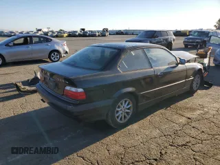 1999 BMW 3 Series 328is with VIN WBABG133XXET07976, listed as a Copart auction lot 67804724 with 139,337 mi miles and Salvage Title. Bid and sale history available at carsss.com. Image 3.