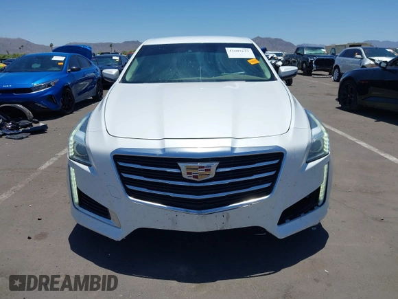 2015 Cadillac CTS Luxury RWD with VIN 1G6AR5SX7F0106703, listed as a IAAI auction lot 42607622 with 79,539 mi miles and . Bid and sale history available at DreamBid. Image 6.