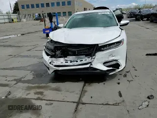2019 Honda Insight Touring z VIN 19XZE4F9XKE007764, wystawiony jako Copart lot #54619275 z przebiegiem 24 441 mil mil oraz Szkoda całkowita • Salvage title. Historia ofert i sprzedaży dostępna na DreamBid. Obrazek 13.