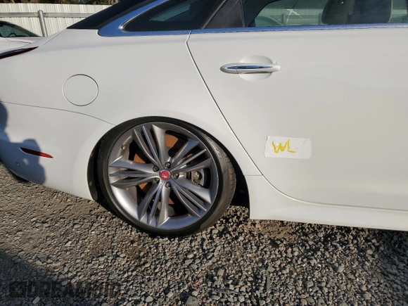 2016 Jaguar XJ with VIN SAJWA1CE4GMV91734, listed as a Copart auction lot 81005144 with 31,924 mi miles and Salvage Title. Bid and sale history available at DreamBid. Image 12.
