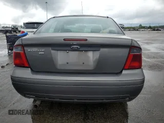 2007 Ford Focus S z VIN 1FAHP34N27W144992, wystawiony jako Copart lot #65571385 z przebiegiem 194 933 mil mil oraz Szkoda całkowita • Salvage title. Historia ofert i sprzedaży dostępna na DreamBid. Obrazek 6.