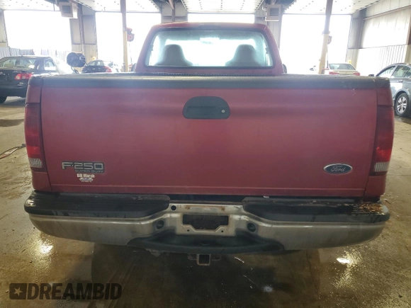 2002 Ford F-250 XL with VIN 1FTNF20LX2EB18296, listed as a Copart auction lot 64506675 with 121,467 mi miles and Salvage title. Bid and sale history available at DreamBid. Image 6.