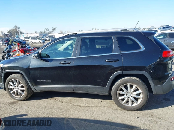 2014 Jeep Cherokee Limited with VIN 1C4PJMDB9EW210180, listed as a IAAI auction lot 41302037 with 75,177 mi miles and . Bid and sale history available at DreamBid. Image 14.
