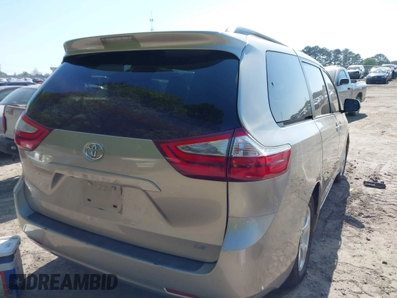 2015 Toyota Sienna LE AAS with VIN 5TDKK3DCXFS552524, listed as a IAAI auction lot 42060065 with 249,332 mi miles and . Bid and sale history available at DreamBid. Image 4.