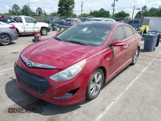2012 Hyundai Sonata Hybrid z VIN KMHEC4A4XCA031014, wystawiony jako IAAI lot #42463501 z przebiegiem 113 309 mil mil oraz . Historia ofert i sprzedaży dostępna na DreamBid. Obrazek 2.