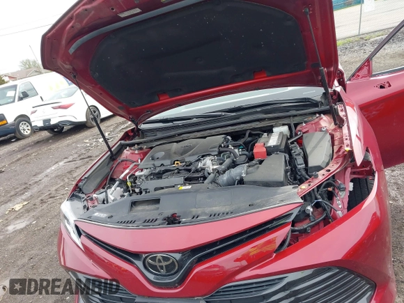 2019 Toyota Camry LE with VIN 4T1B11HK8KU823736, listed as a IAAI auction lot 42166696 with 21,732 mi miles and . Bid and sale history available at DreamBid. Image 10.
