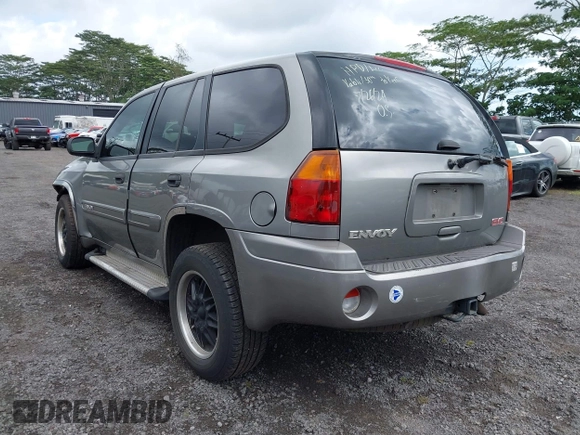 2005 GMC Envoy SLT z VIN 1GKDS13S152161472, wystawiony jako IAAI lot #40110978 z przebiegiem 141 908 mil mil oraz . Historia ofert i sprzedaży dostępna na DreamBid. Obrazek 3.