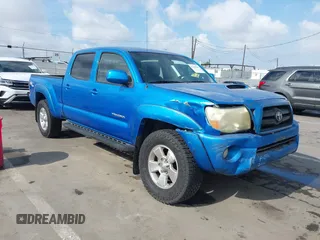 2006 Toyota Tacoma PreRunner z VIN 3TMKU72N46M007487, wystawiony jako IAAI lot #41429282 z przebiegiem 73 184 mil mil oraz . Historia ofert i sprzedaży dostępna na DreamBid. Obrazek 1.