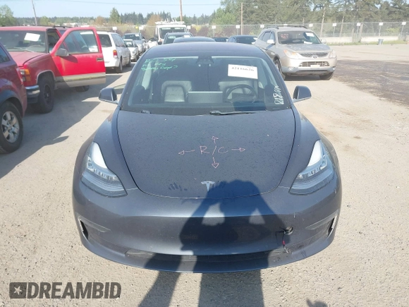 2018 Tesla Model 3 Long Range Battery with VIN 5YJ3E1EA1JF021139, listed as a IAAI auction lot 42116626 with 83,003 mi miles and . Bid and sale history available at DreamBid. Image 12.
