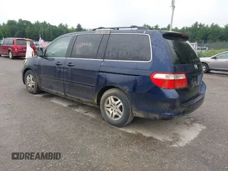 2005 Honda Odyssey EX-L with VIN 5FNRL38725B001662, listed as a IAAI auction lot 42693301 with 161,114 mi miles and . Bid and sale history available at DreamBid. Image 3.