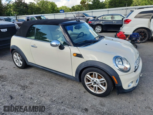 2011 MINI Convertible with VIN WMWZN3C59BTZ78433, listed as a Copart auction lot 65509575 with 102,800 mi miles and Clean title. Bid and sale history available at DreamBid. Image 4.