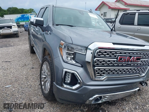2019 GMC Sierra 1500 Denali with VIN 1GTU9FEL7KZ355632, listed as a IAAI auction lot 42487913 with 51,467 mi miles and . Bid and sale history available at DreamBid. Image 1.