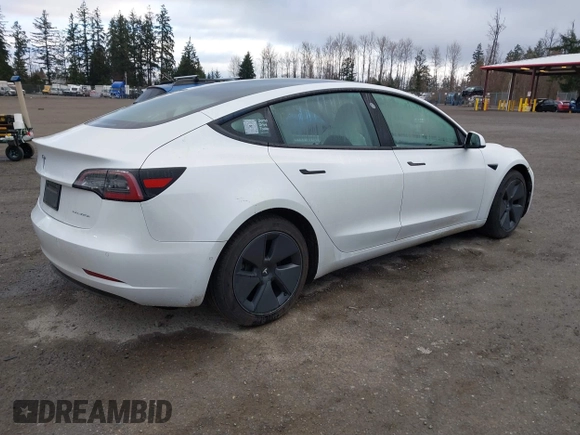 2021 Tesla Model 3 Long Range with VIN 5YJ3E1EB3MF856009, listed as a IAAI auction lot 41809767 with 42,072 mi miles. Bid and sale history available at carsss.com. Image 4.