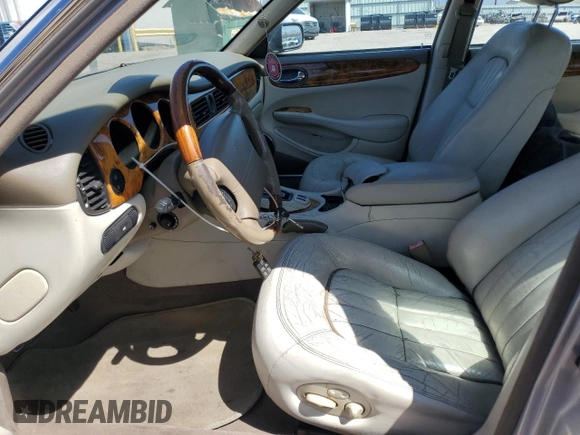 2003 Jaguar XJ 8 z VIN SAJDA14C23LF59484, wystawiony jako Copart lot #50304475 z przebiegiem Nie podano mil oraz Czysty tytuł • Clean title. Historia ofert i sprzedaży dostępna na DreamBid. Obrazek 7.