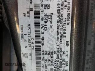 2013 Ford Focus SE z VIN 1FADP3F22DL233878, wystawiony jako Copart lot #52598475 z przebiegiem 131 539 mil mil oraz Szkoda całkowita • Salvage title. Historia ofert i sprzedaży dostępna na DreamBid. Obrazek 13.