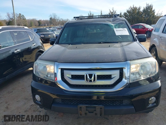 2011 Honda Pilot EX-L with VIN 5FNYF4H65BB053914, listed as a IAAI auction lot 41599171 with 230,186 mi miles and . Bid and sale history available at carsss.com. Image 12.