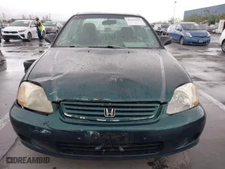 1999 Honda Civic VP with VIN 2HGEJ6618XH579736, listed as a IAAI auction lot 41912296 with 268,631 mi miles. Bid and sale history available at carsss.com. Image 13.