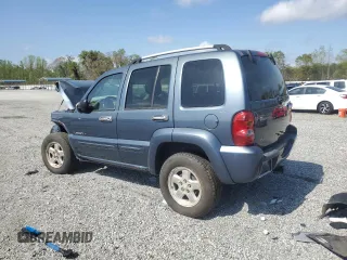 2002 Jeep Liberty Limited with VIN 1J8GL58K32W144319, listed as a Copart auction lot 51571025 with 145,913 mi miles and Salvage title. Bid and sale history available at DreamBid. Image 2.