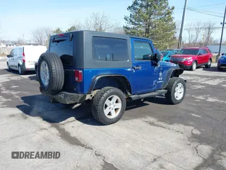 2009 Jeep Wrangler X with VIN 1J4FA24169L739367, listed as a IAAI auction lot 41810359 with 193,192 mi miles and . Bid and sale history available at carsss.com. Image 4.