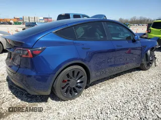 2022 Tesla Model Y Performance z VIN 7SAYGDEF2NF461103, wystawiony jako Copart lot #52198205 z przebiegiem 33 576 mil mil oraz Szkoda całkowita • Salvage title. Historia ofert i sprzedaży dostępna na DreamBid. Obrazek 3.