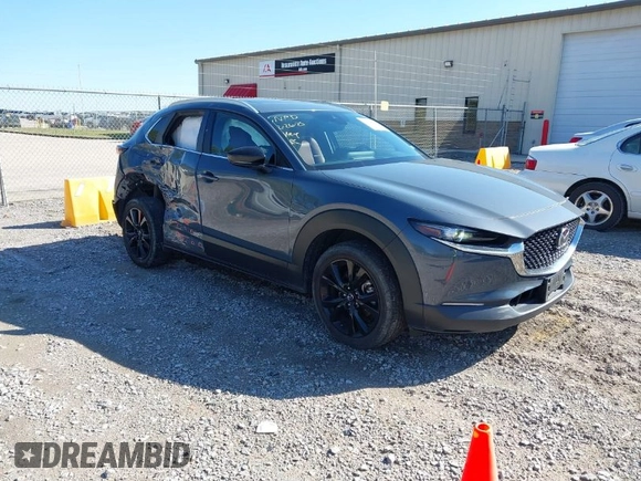 2023 Mazda CX-30 2.5 S Carbon Edition with VIN 3MVDMBCM5PM528946, listed as a IAAI auction lot 41882936 with 62,815 mi miles. Bid and sale history available at carsss.com. Image 1.
