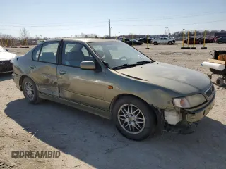2000 Infiniti G20 Luxury z VIN JNKCP11A5YT311938, wystawiony jako Copart lot #48509185 z przebiegiem 186 595 mil mil oraz Szkoda całkowita • Salvage title. Historia ofert i sprzedaży dostępna na DreamBid. Obrazek 4.