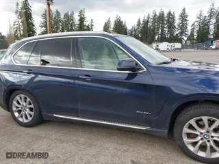 2015 BMW X5 xDrive35d with VIN 5UXKS4C55F0J98874, listed as a IAAI auction lot 42030583 with 151,079 mi miles. Bid and sale history available at carsss.com. Image 13.