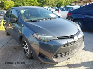 2018 Toyota Corolla L z VIN 2T1BURHE3JC058810, wystawiony jako IAAI lot #42236449 z przebiegiem 126 557 mil mil oraz . Historia ofert i sprzedaży dostępna na DreamBid. Obrazek 1.