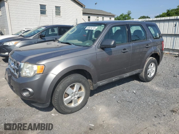 2012 Ford Escape XLS with VIN 1FMCU0C78CKA70652, listed as a Copart auction lot 60624215 with 203,220 mi miles and Clean title. Bid and sale history available at DreamBid. Image 1.