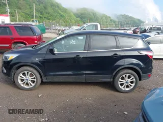 2017 Ford Escape SE with VIN 1FMCU9GD0HUC62616, listed as a IAAI auction lot 42194561 with 97,897 mi miles and . Bid and sale history available at DreamBid. Image 14.