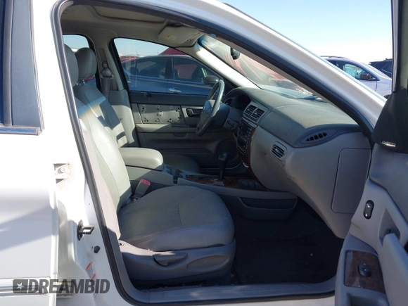 2003 Mercury Sable LS Premium with VIN 1MEHM55S73G630347, listed as a IAAI auction lot 41427588 with 125,285 mi miles. Bid and sale history available at carsss.com. Image 5.