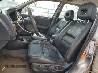 1999 Infiniti G20 z VIN JNKCP11A8XT015021, wystawiony jako Copart lot #67966844 z przebiegiem 268 922 mil mil oraz Szkody całkowita. Historia ofert i sprzedaży dostępna na DreamBid. Obrazek 7.