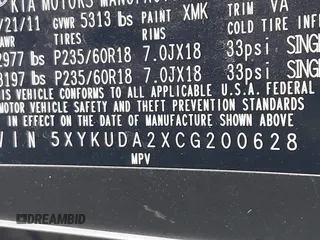 2012 Kia Sorento EX with VIN 5XYKUDA2XCG200628, listed as a IAAI auction lot 41495625 with 207,229 mi miles. Bid and sale history available at carsss.com. Image 9.