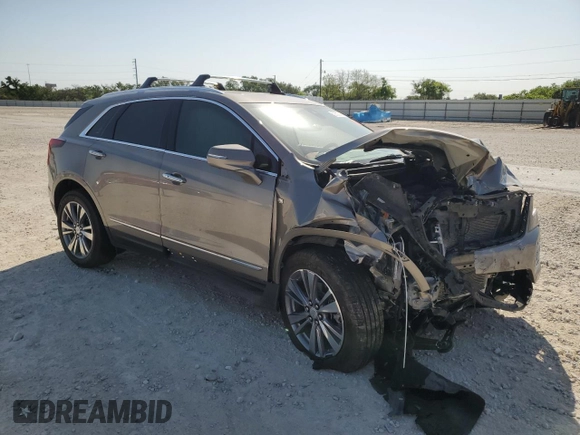 2022 Cadillac XT5 Premium Luxury AWD with VIN 1GYKNERS9NZ120517, listed as a Copart auction lot 52633745 with 31,456 mi miles and Salvage Title. Bid and sale history available at carsss.com. Image 4.
