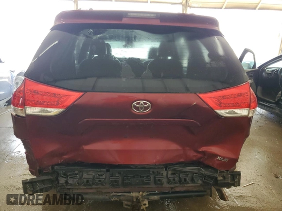 2011 Toyota Sienna XLE AAS with VIN 5TDYK3DC8BS024209, listed as a Copart auction lot 58923715 with 134,051 mi miles and Salvage title. Bid and sale history available at DreamBid. Image 6.
