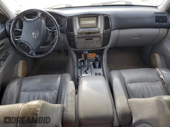2003 Toyota Land Cruiser with VIN JTEHT05J932044630, listed as a Copart auction lot 76836364 with 215,802 mi miles and Salvage Title. Bid and sale history available at carsss.com. Image 8.